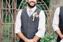 vestuves italijoje, vilma rapsaite, vestuviu organizavimas italijoje, vestuviu organizavimas ir planavimas italijoje, vilma wedding a-stylish-and-vivacious-grooms-outfit-with-navy-pants-a-grey-waistcoat-a-light-blue-tie-and-a-white-shirt-with-roleld-up-sleeves